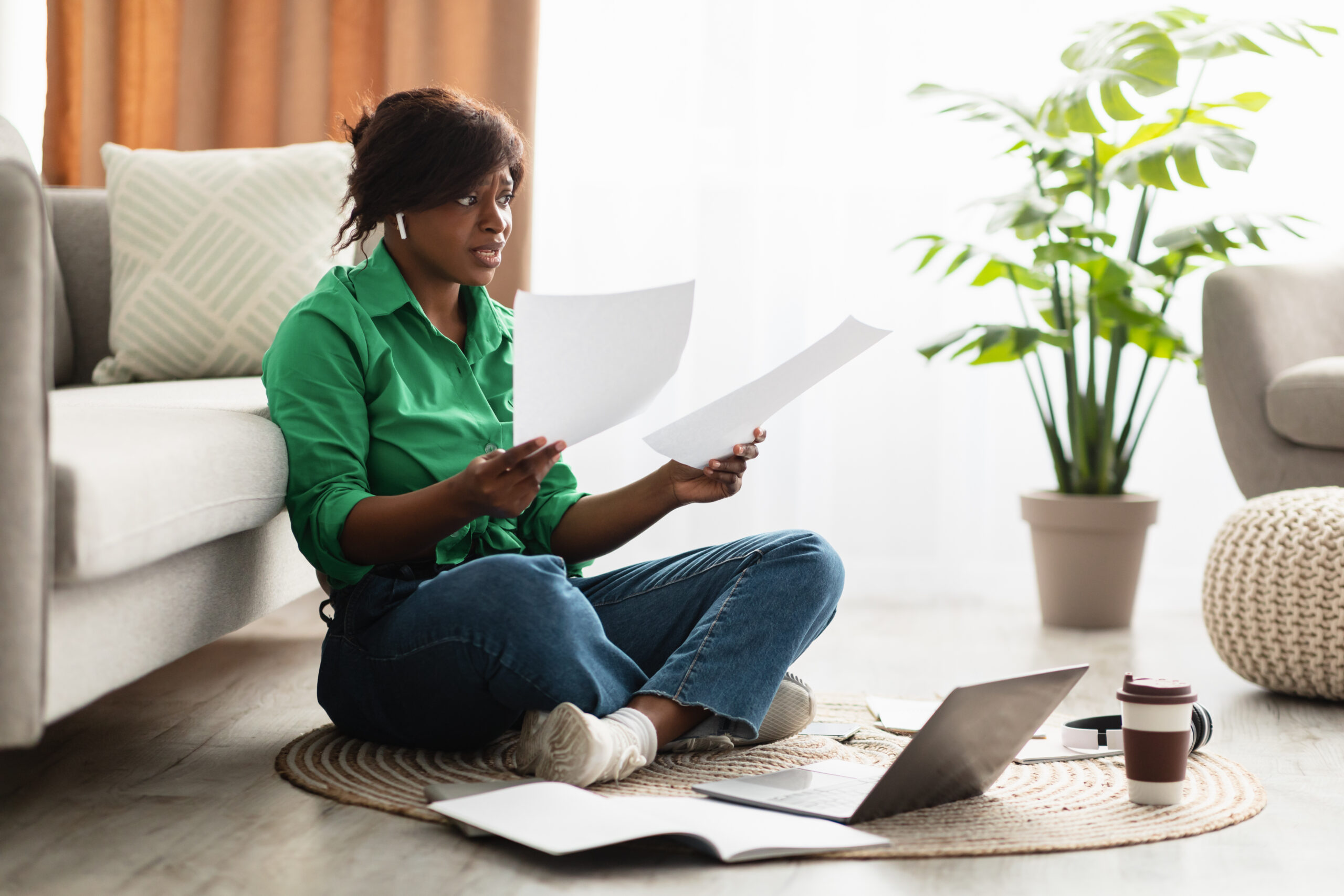 woman stressed while reading the mail