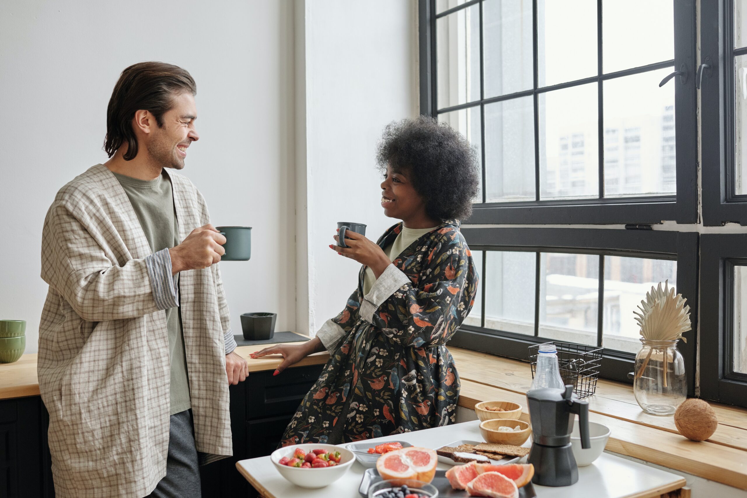 couple having breakfast in the kitchen