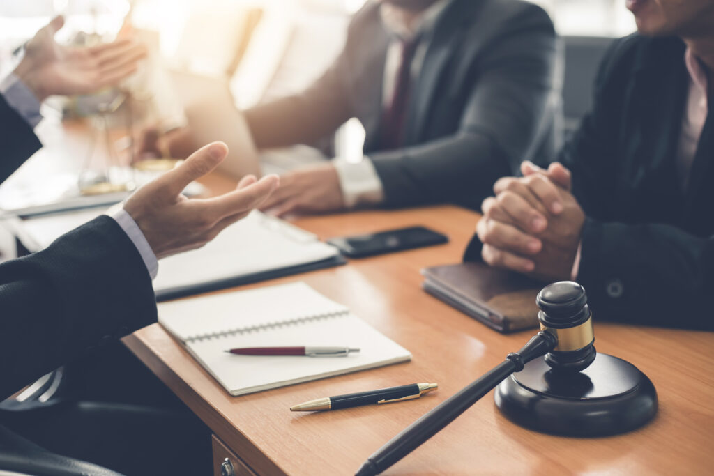 Lawyers discussing a case during an arbitration.