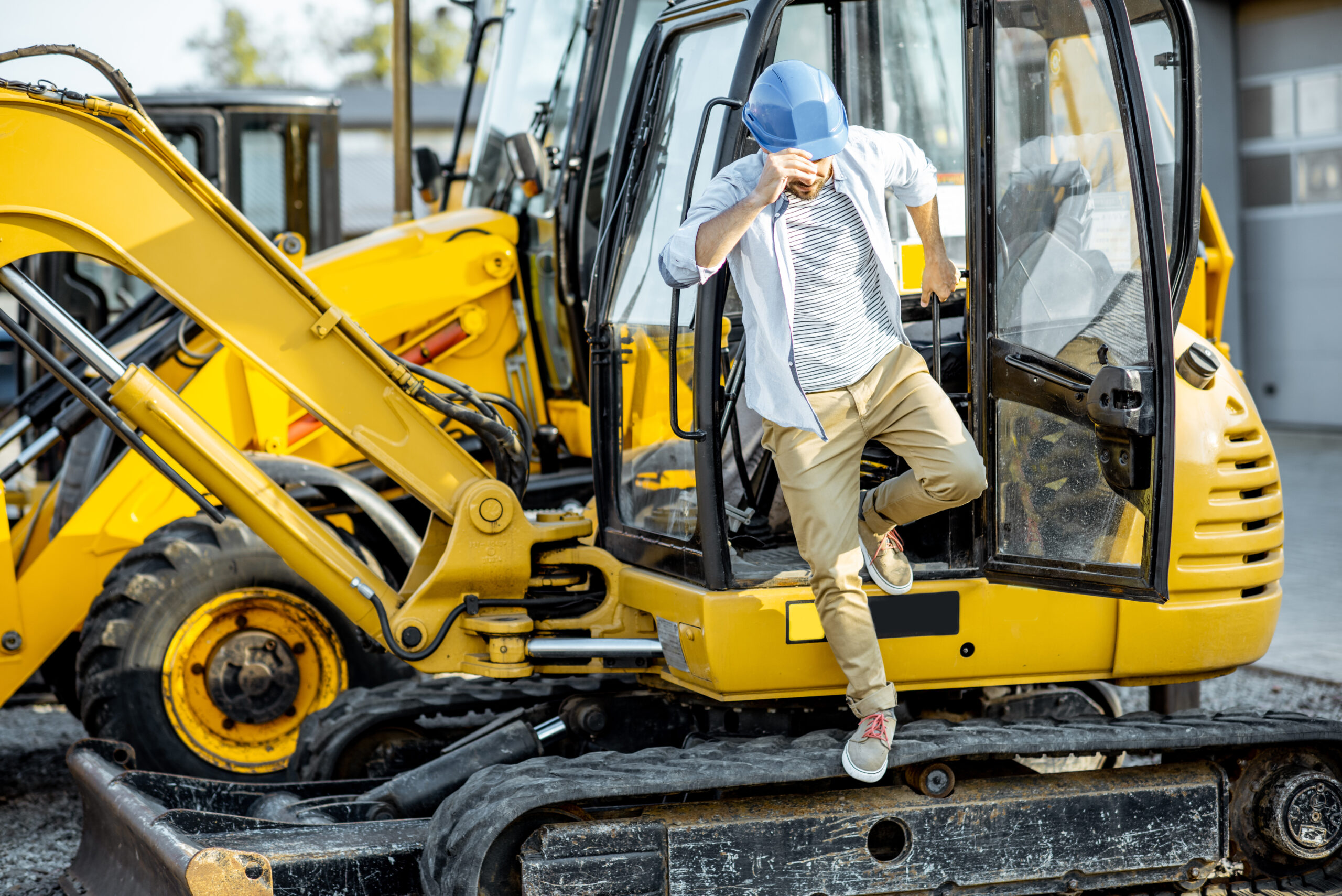 Man exiting bulldozer