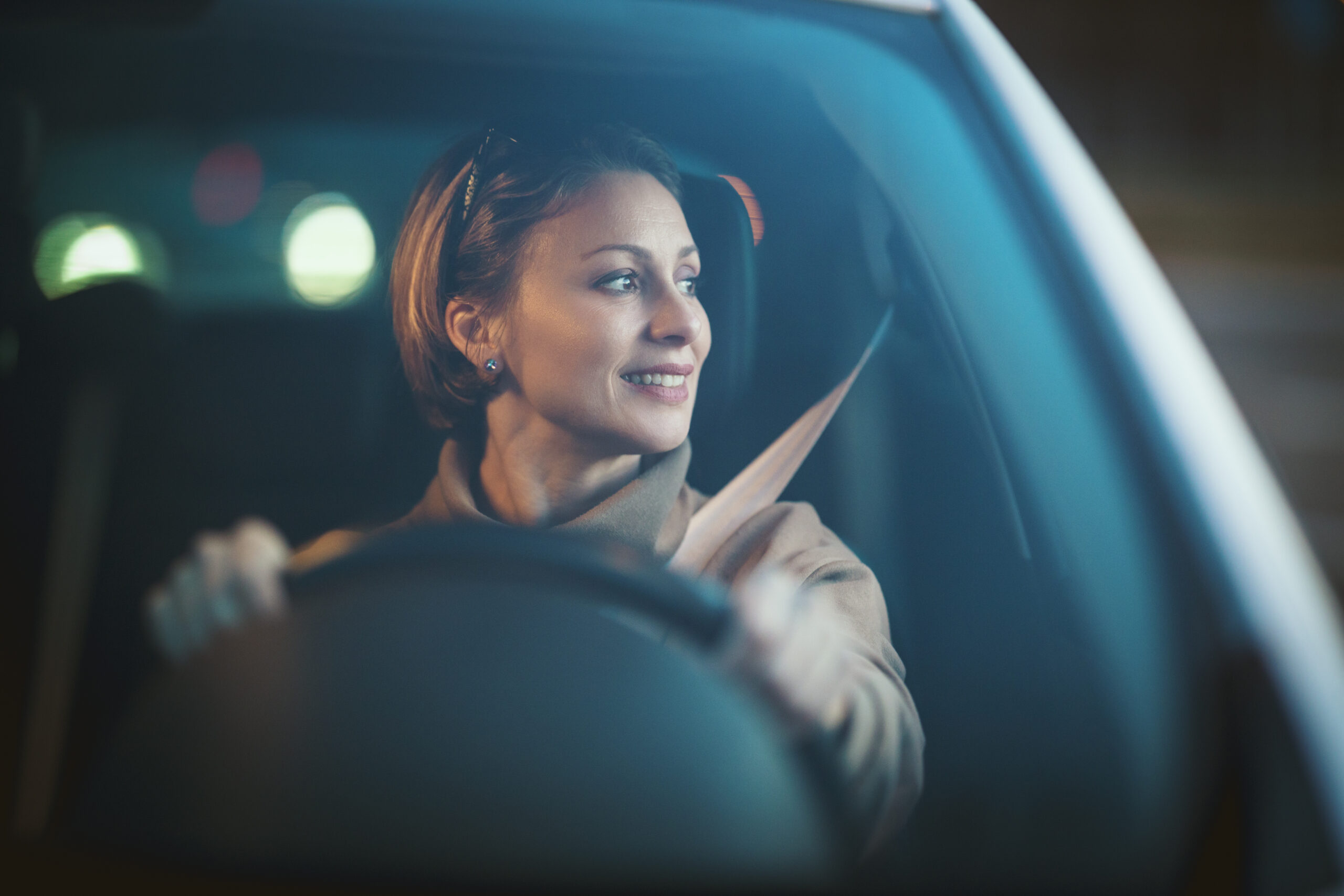 woman sitting in drivers seat